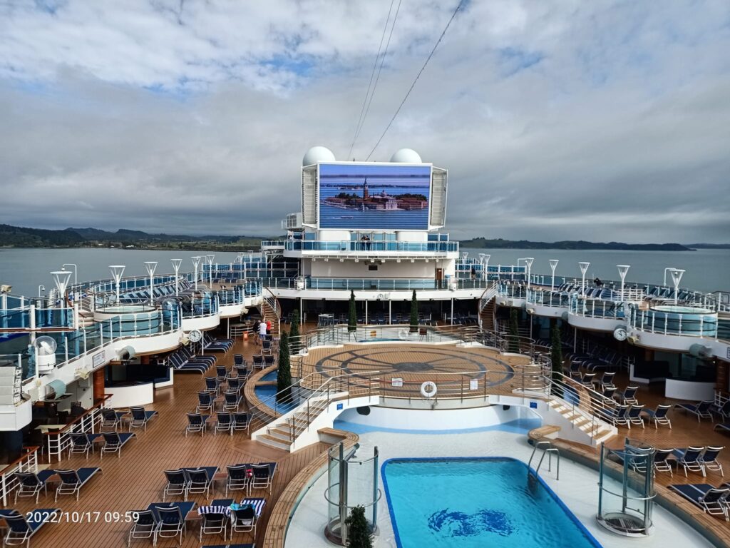 view from above of the pool and deck chaiirs