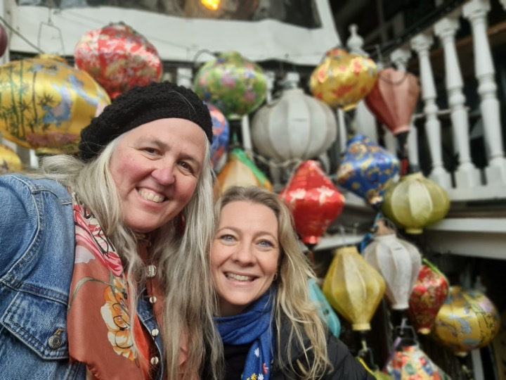 Jo and NIkki with Chinese lanterns in the background